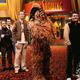 Illustration for article titled Guy Wearing Chewbacca Costume Torn Between Seeing ‘Star Wars’ And ‘The Big Short’